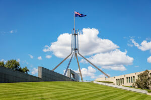 Australian Flag on steel spire Australian New Parliament House